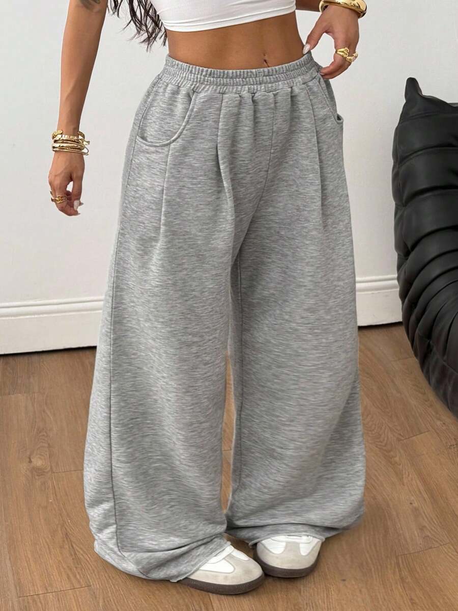 Women's loose wide leg casual sweatpants with an elastic waistband and side pockets