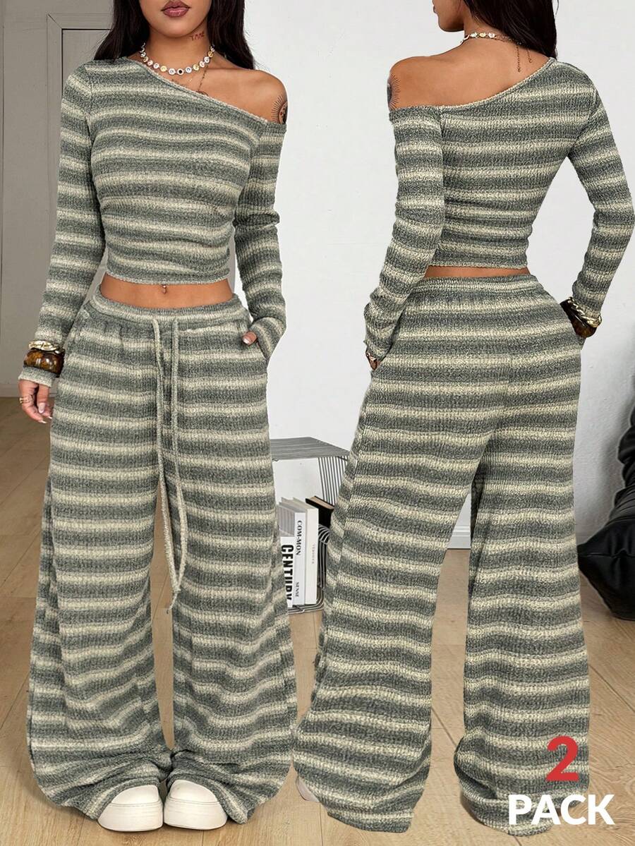 Women's two-piece striped knit tracksuit set featuring a brown asymmetrical neckline long sleeve crop top and matching high-waisted wide leg sweatpants.