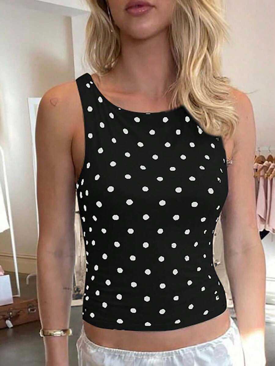Women's polka dot sleeveless tank top with round neck, ruched rib-knit detail, regular hem, and slim fit casual style