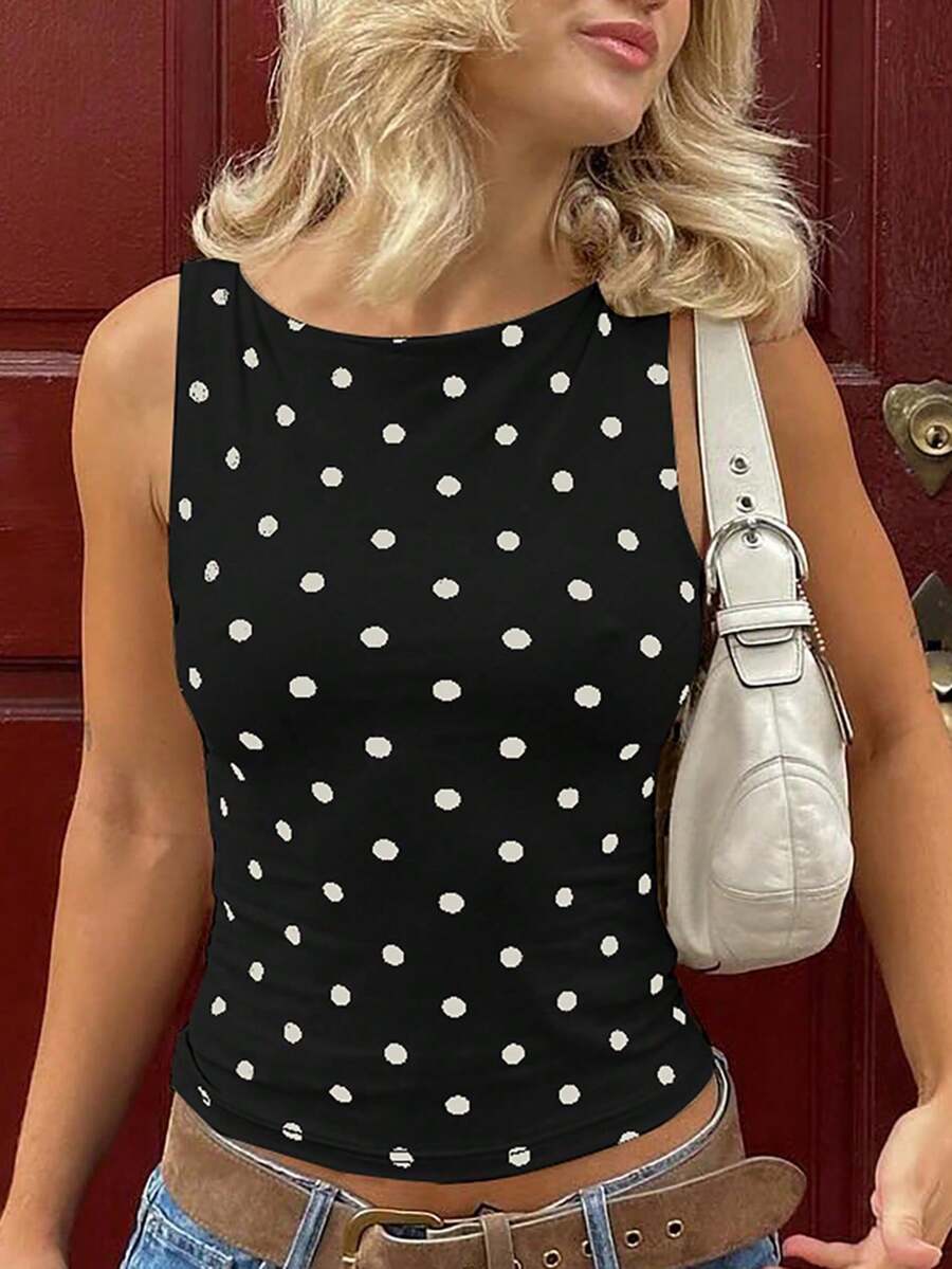 Women's polka dot sleeveless tank top with round neck, ruched rib-knit detail, regular hem, and slim fit casual style