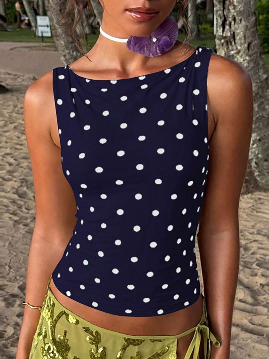 Women's polka dot sleeveless tank top with round neck, ruched rib-knit detail, regular hem, and slim fit casual style