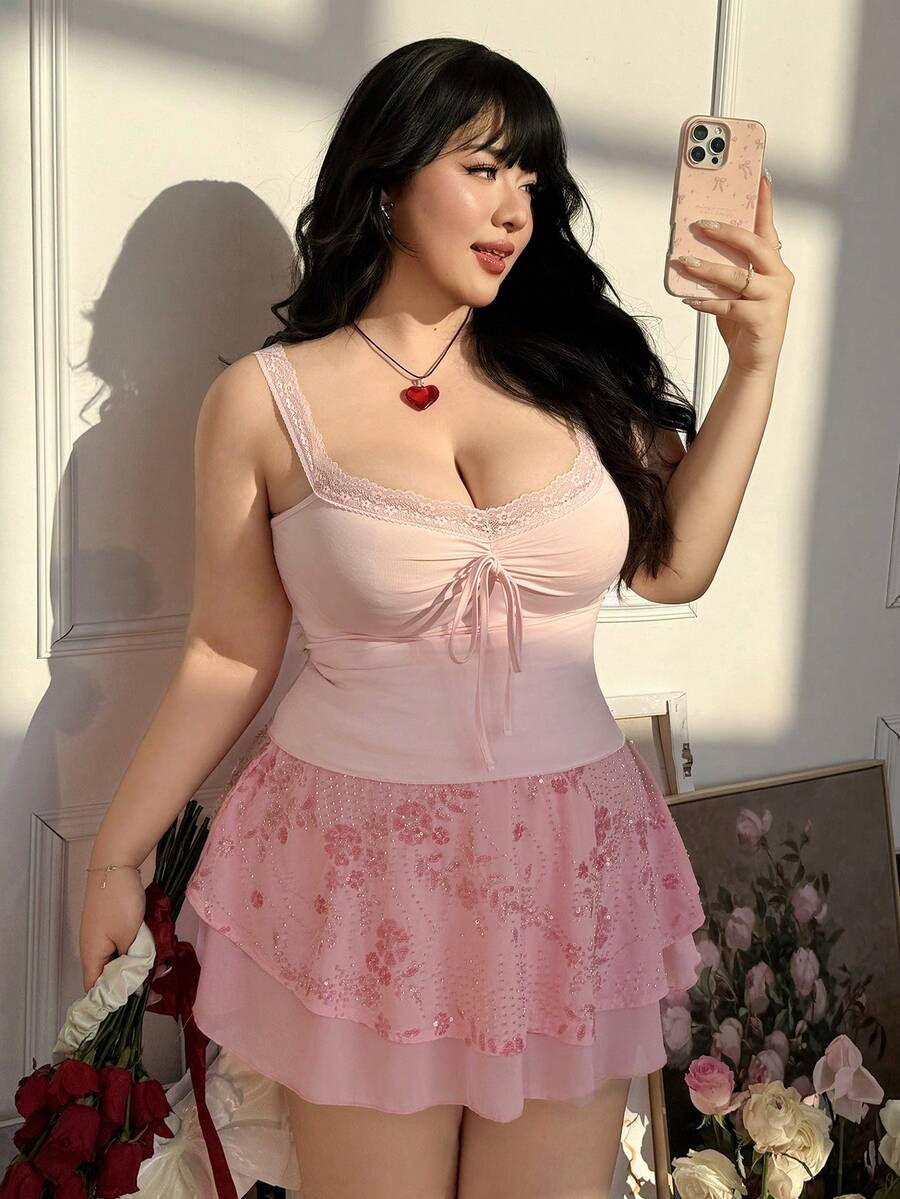 Women's slim fit casual camisole featuring wide shoulder straps, contrast lace trim, a front knot, and ruched details.
