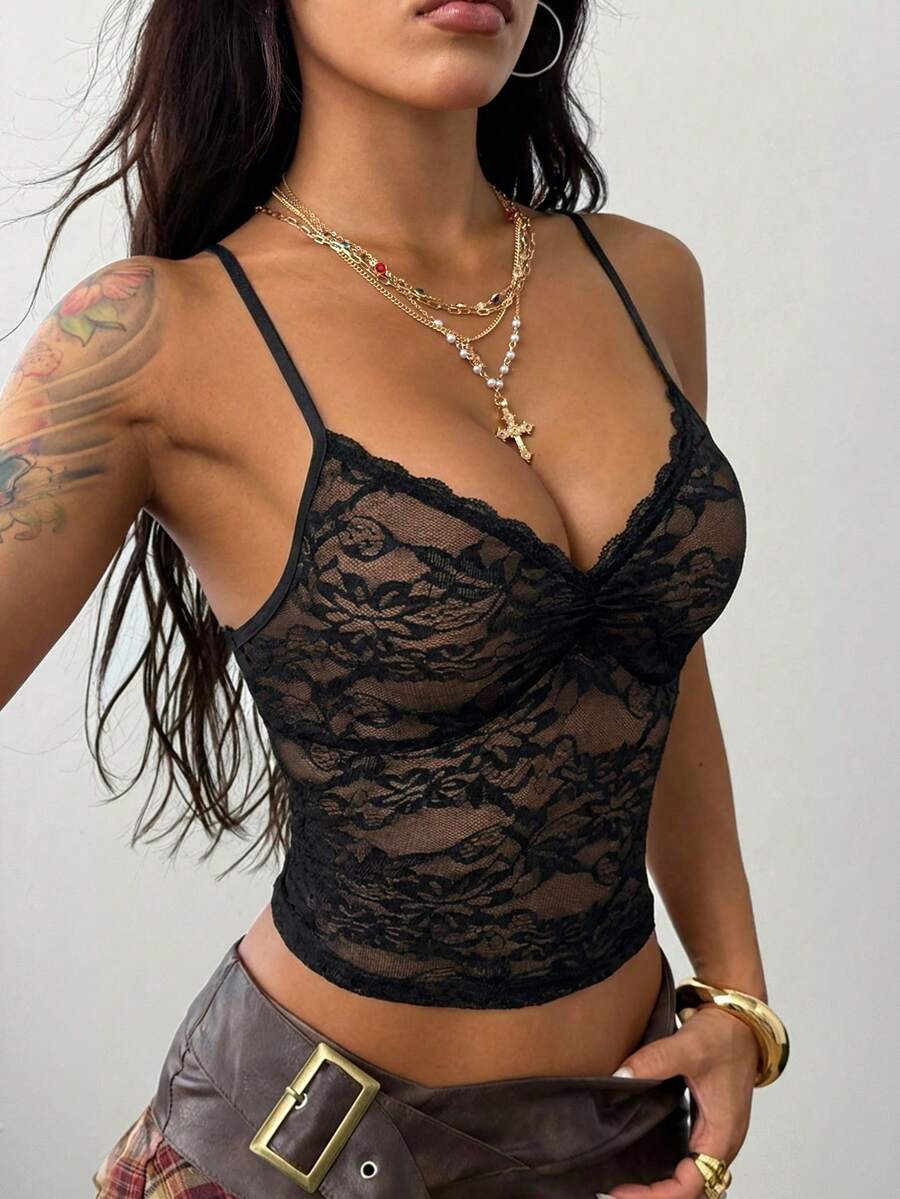 Women's black lace crop cami top featuring spaghetti straps, cold shoulder sleeves, and a sheer backless design.