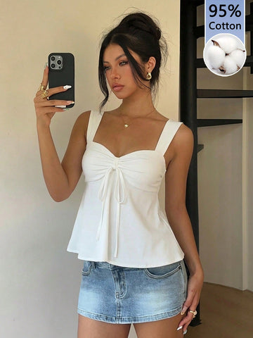 Women's white wide strap tank top with drawstring front, eyelet embroidery, ruffle hem, slim fit, and flared hem.