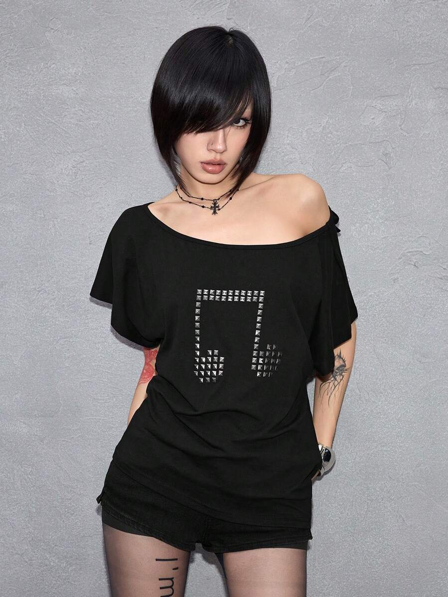 Women's grunge punk style short sleeve t-shirt featuring an asymmetrical neckline, hollow-out cut detail, and relaxed batwing sleeves in a soft cotton stretch fabric.