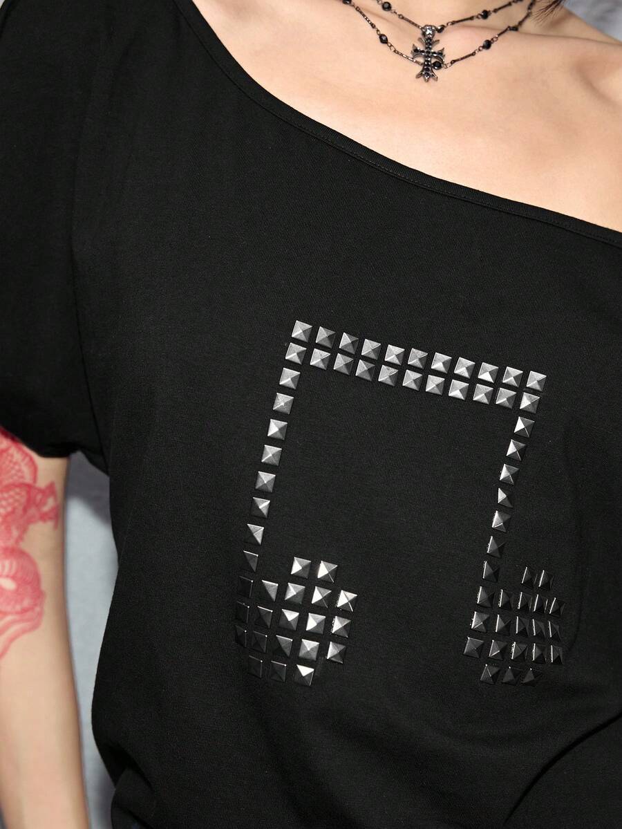 Women's grunge punk style short sleeve t-shirt featuring an asymmetrical neckline, hollow-out cut detail, and relaxed batwing sleeves in a soft cotton stretch fabric.