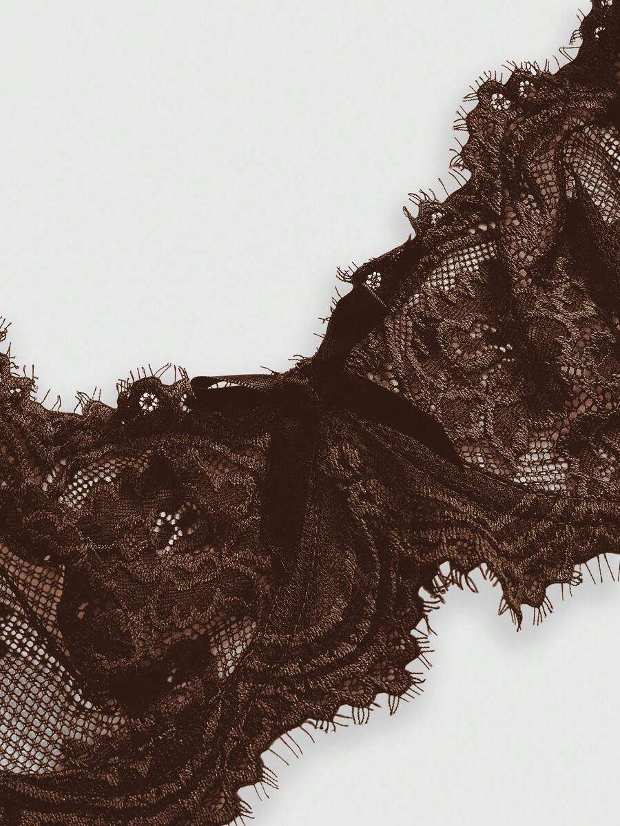 Sheer floral lace underwire triangle bra for women featuring adjustable straps and plunge cup design.
