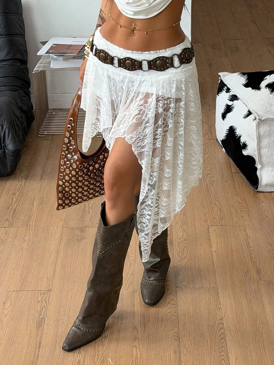Women's floral lace mini skirt in white with asymmetrical ruffle trim and low waist design.