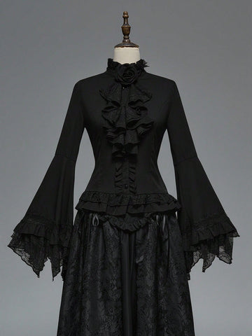 Women's gothic lace blouse with flare long sleeves, tie neckline, and semi-sheer embroidery details.