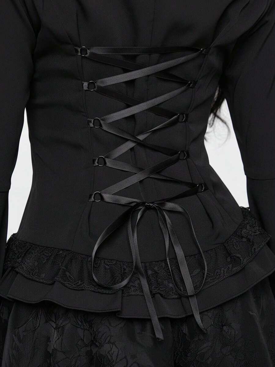 Women's gothic lace blouse with flare long sleeves, tie neckline, and semi-sheer embroidery details.