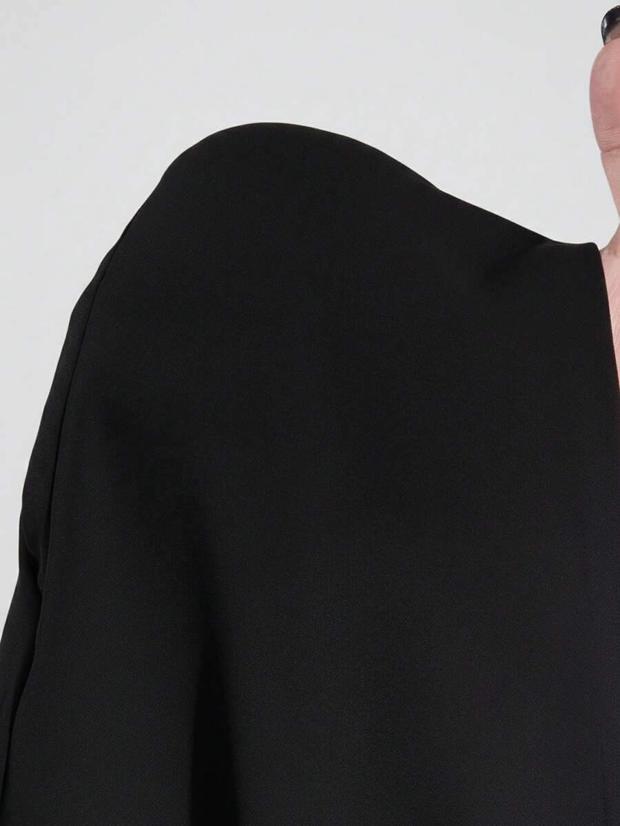 Women's gothic lace blouse with flare long sleeves, tie neckline, and semi-sheer embroidery details.