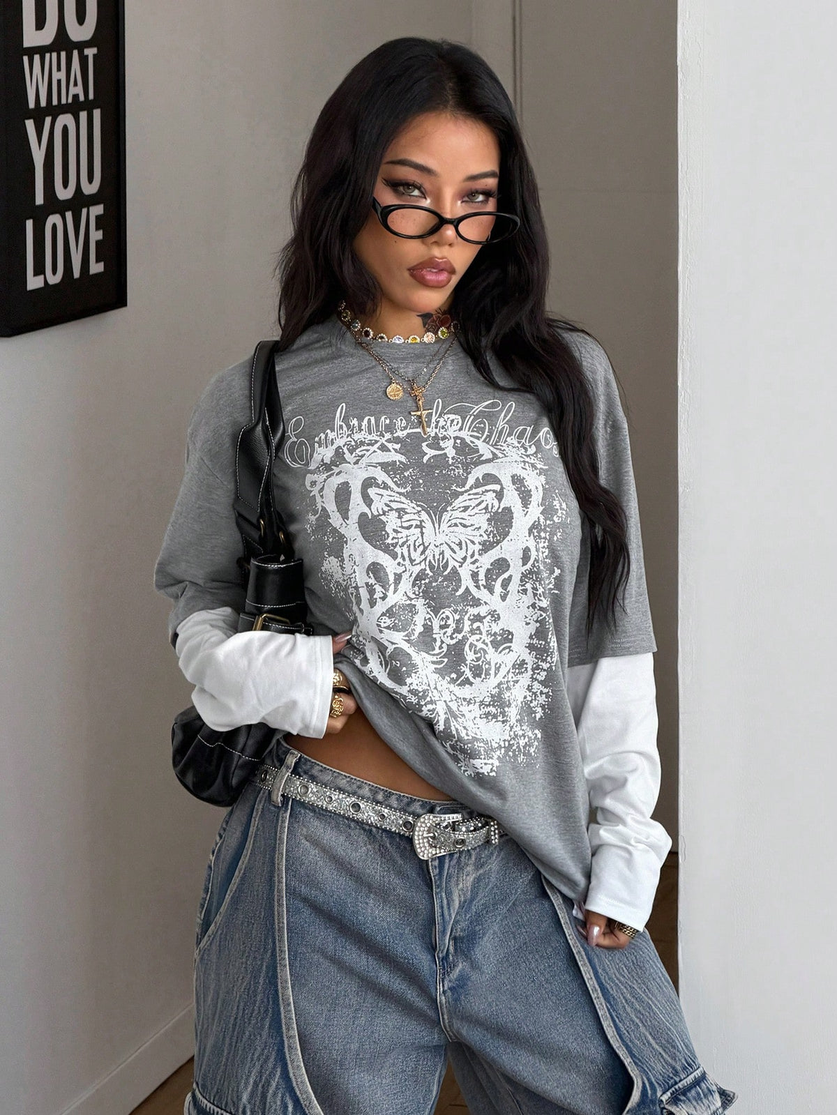 Women's casual graphic long sleeve t-shirt with a round neck, drop shoulder sleeves, and loose relaxed fit.