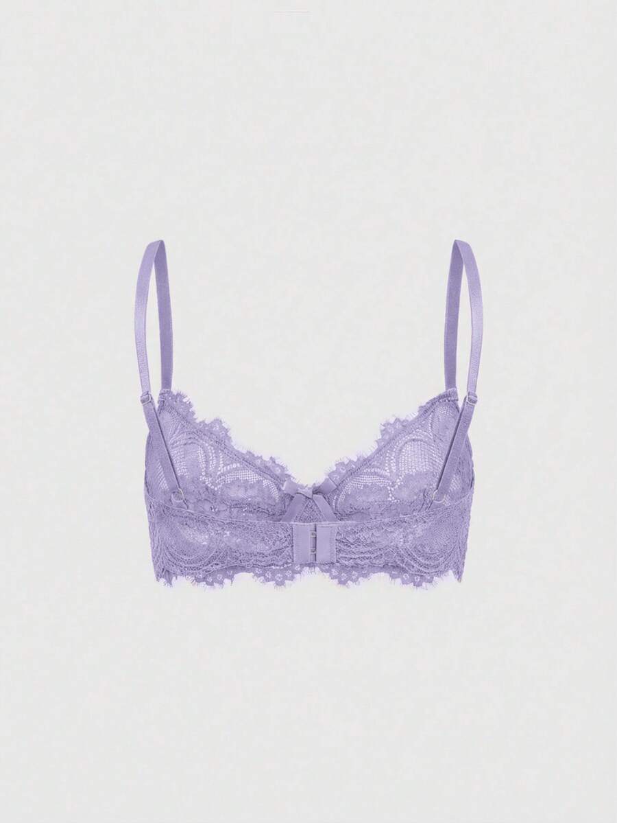 Sheer floral lace underwire triangle bra for women featuring adjustable straps and plunge cup design.