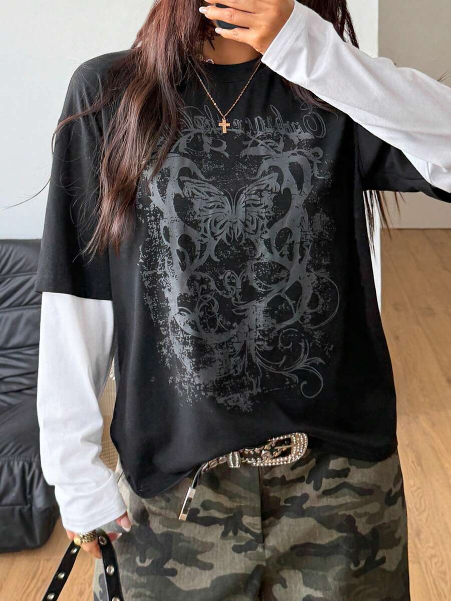 Women's casual graphic long sleeve t-shirt with a round neck, drop shoulder sleeves, and loose relaxed fit.