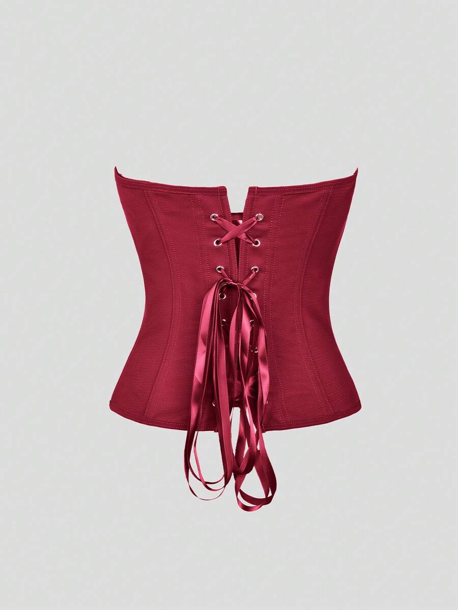 Solid color strapless corset tube top featuring a backless lace-up back design and cropped slim fit.