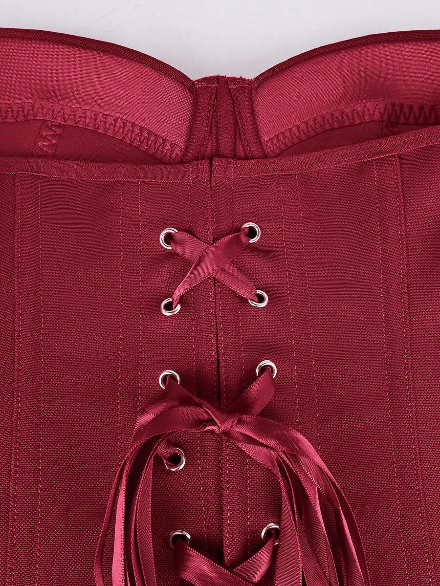 Solid color strapless corset tube top featuring a backless lace-up back design and cropped slim fit.