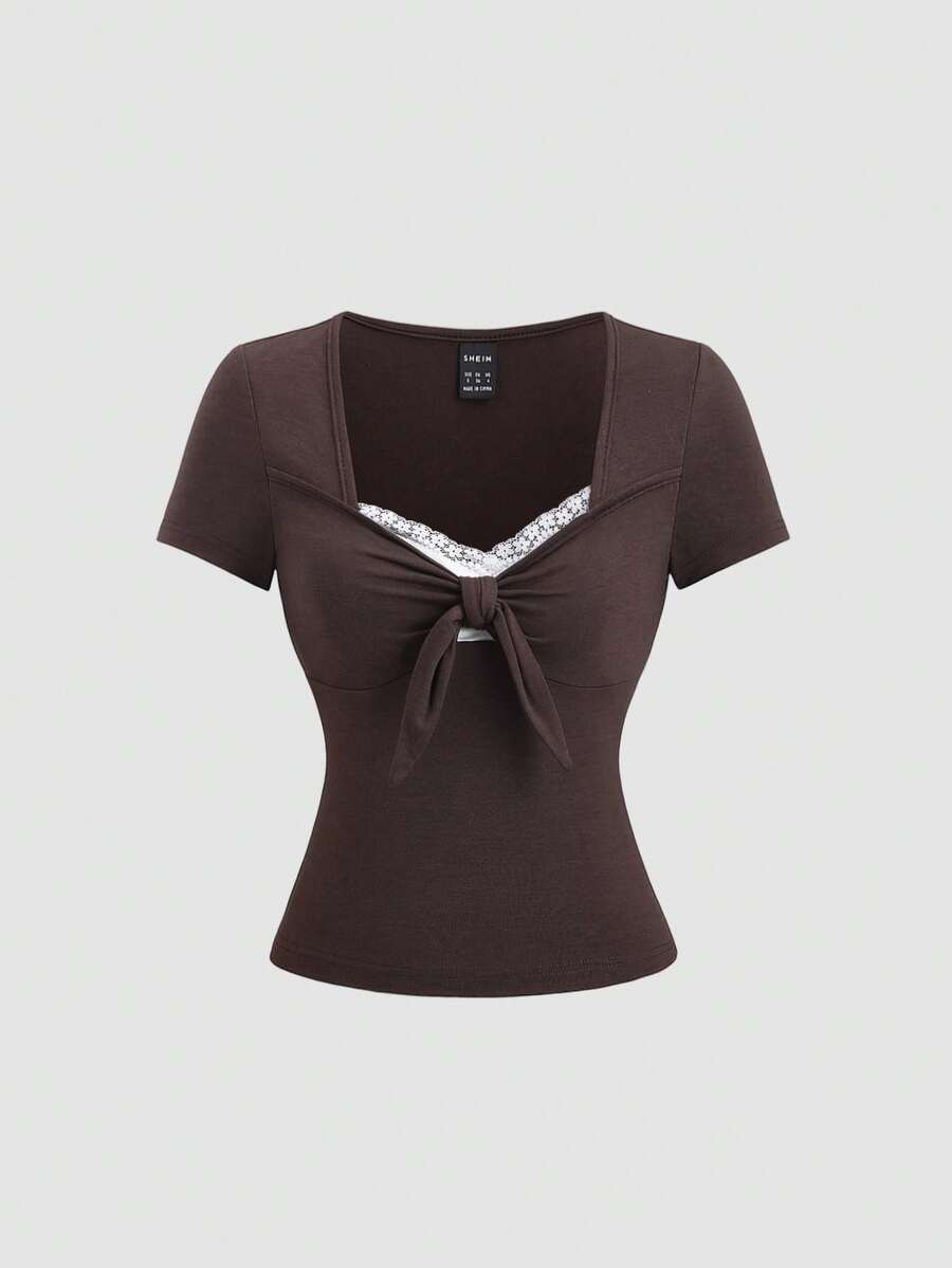 Women's casual short sleeve rib-knit t-shirt with a square neckline, contrast lace detailing, and ruched front.
