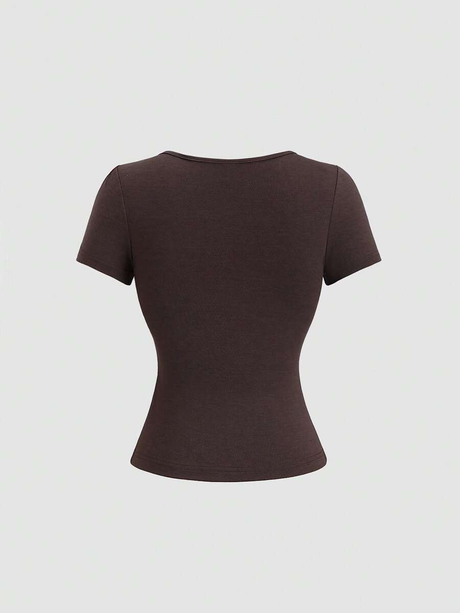 Women's casual short sleeve rib-knit t-shirt with a square neckline, contrast lace detailing, and ruched front.