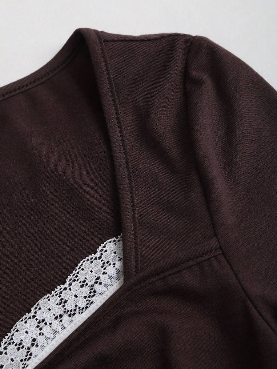 Women's casual short sleeve rib-knit t-shirt with a square neckline, contrast lace detailing, and ruched front.