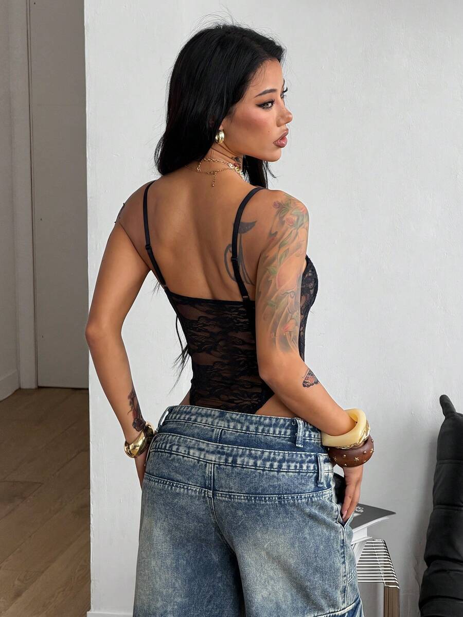 Fitted women's lace and mesh cami bodysuit with spaghetti straps.