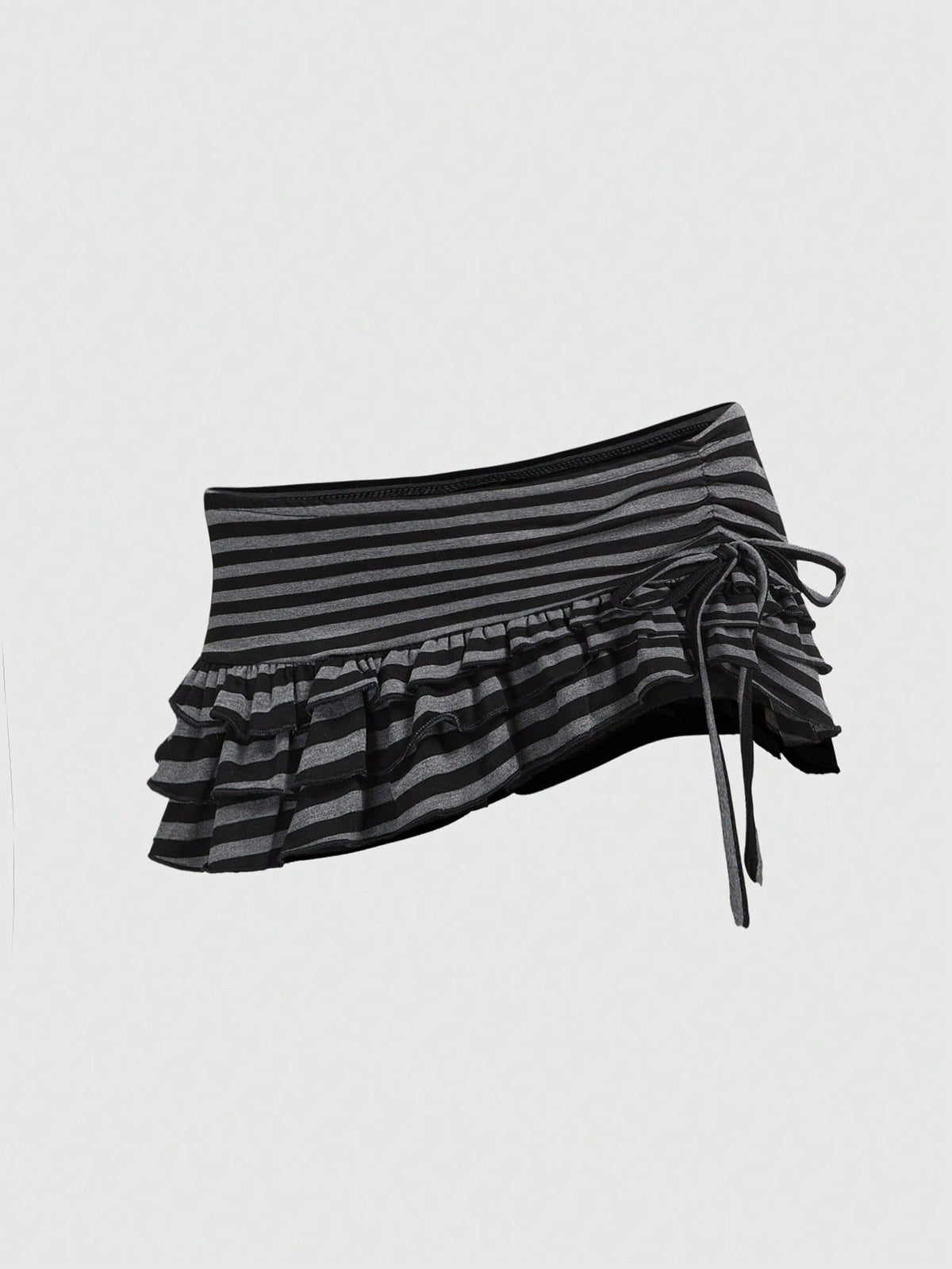 Women's black low-waist mini skirt with drawstring tie, ruched details, lace trim, layered ruffle hem, and asymmetric styling