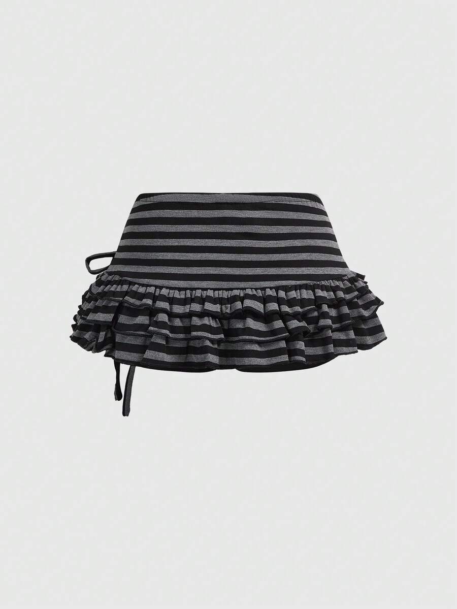Women's black low-waist mini skirt with drawstring tie, ruched details, lace trim, layered ruffle hem, and asymmetric styling