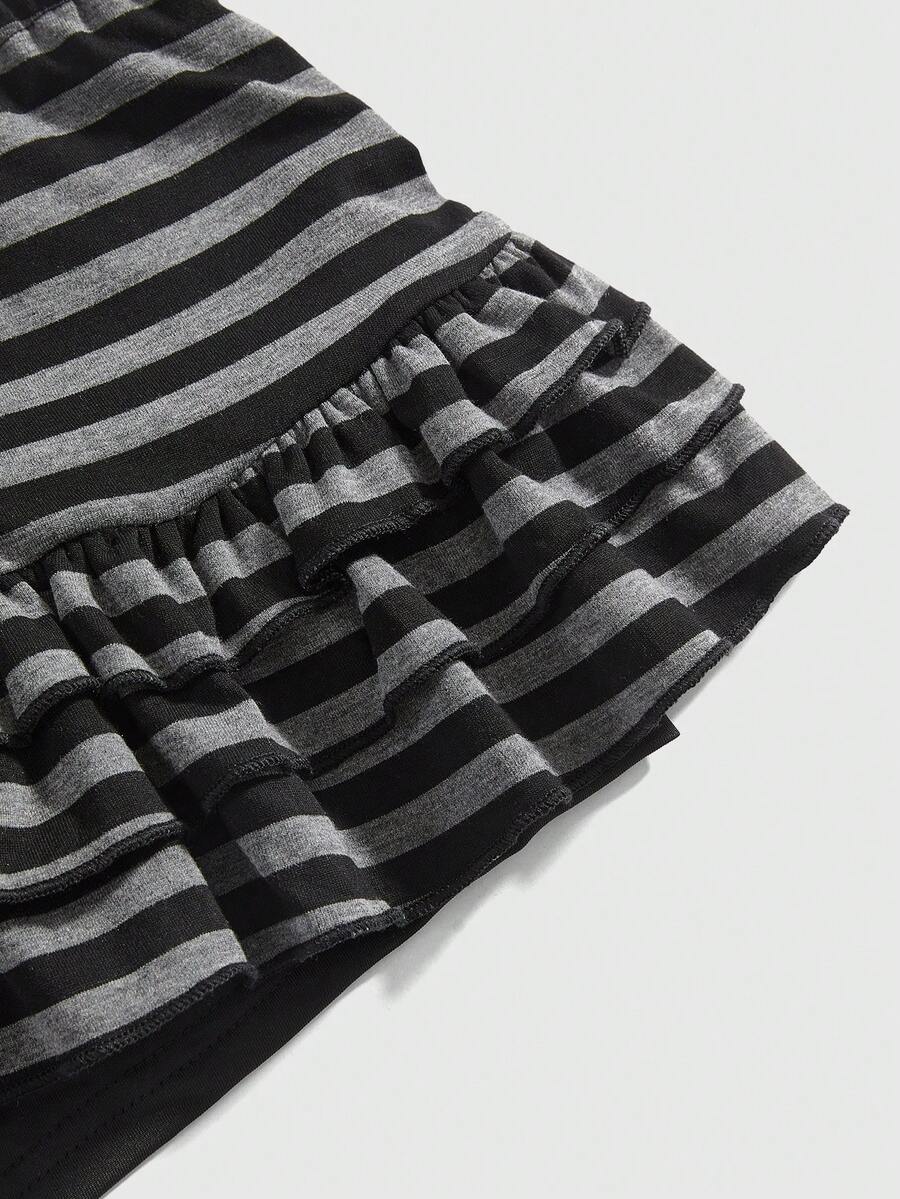 Women's black low-waist mini skirt with drawstring tie, ruched details, lace trim, layered ruffle hem, and asymmetric styling