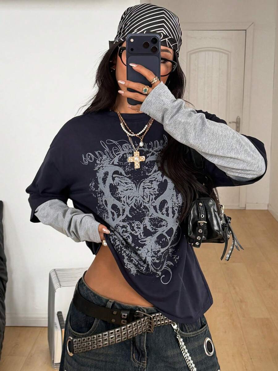 Women's casual graphic long sleeve t-shirt with a round neck, drop shoulder sleeves, and loose relaxed fit.