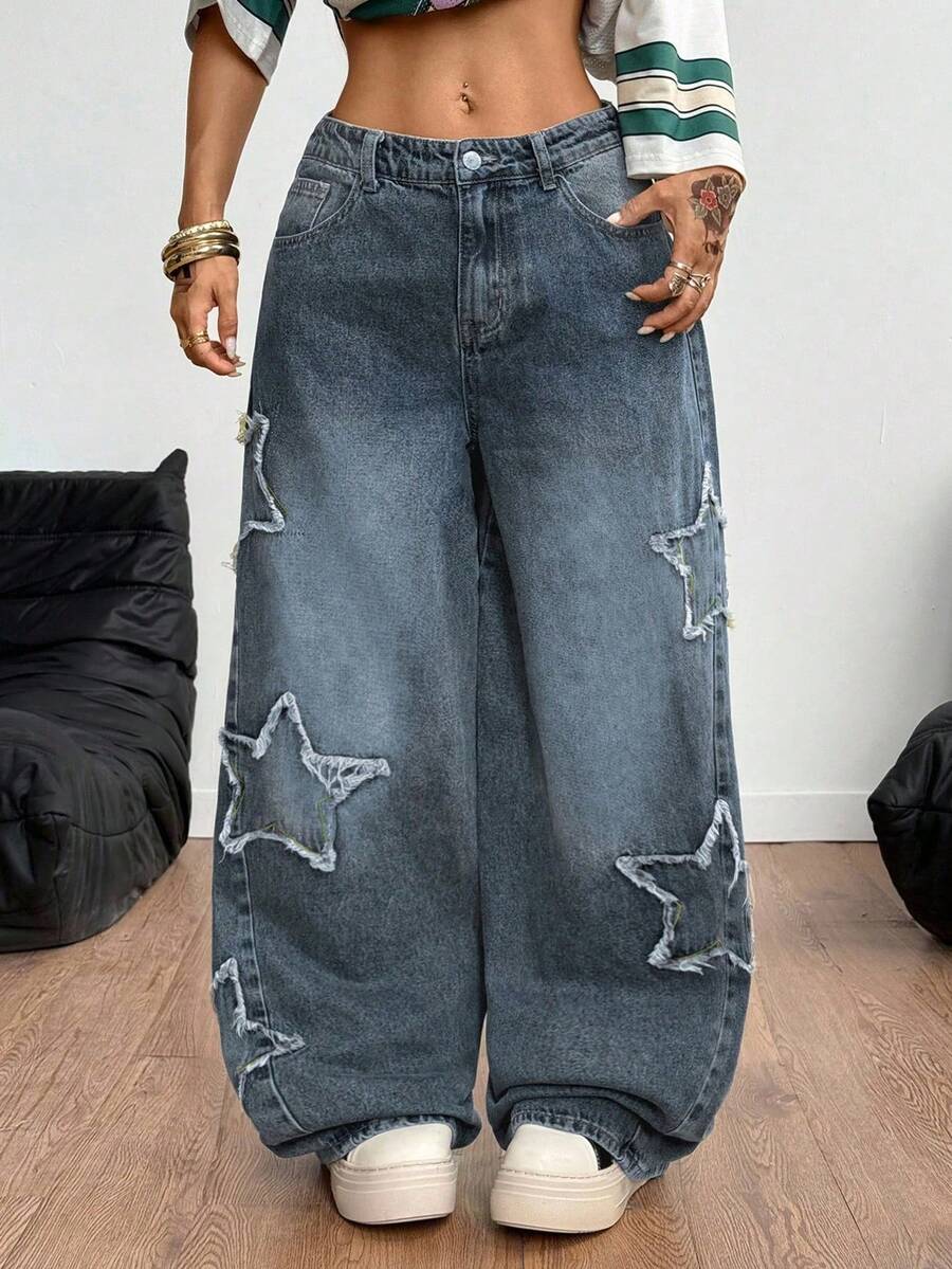Front view of women's loose wide leg denim jeans featuring a mid waist, classic front pockets, and a zipper fly closure.