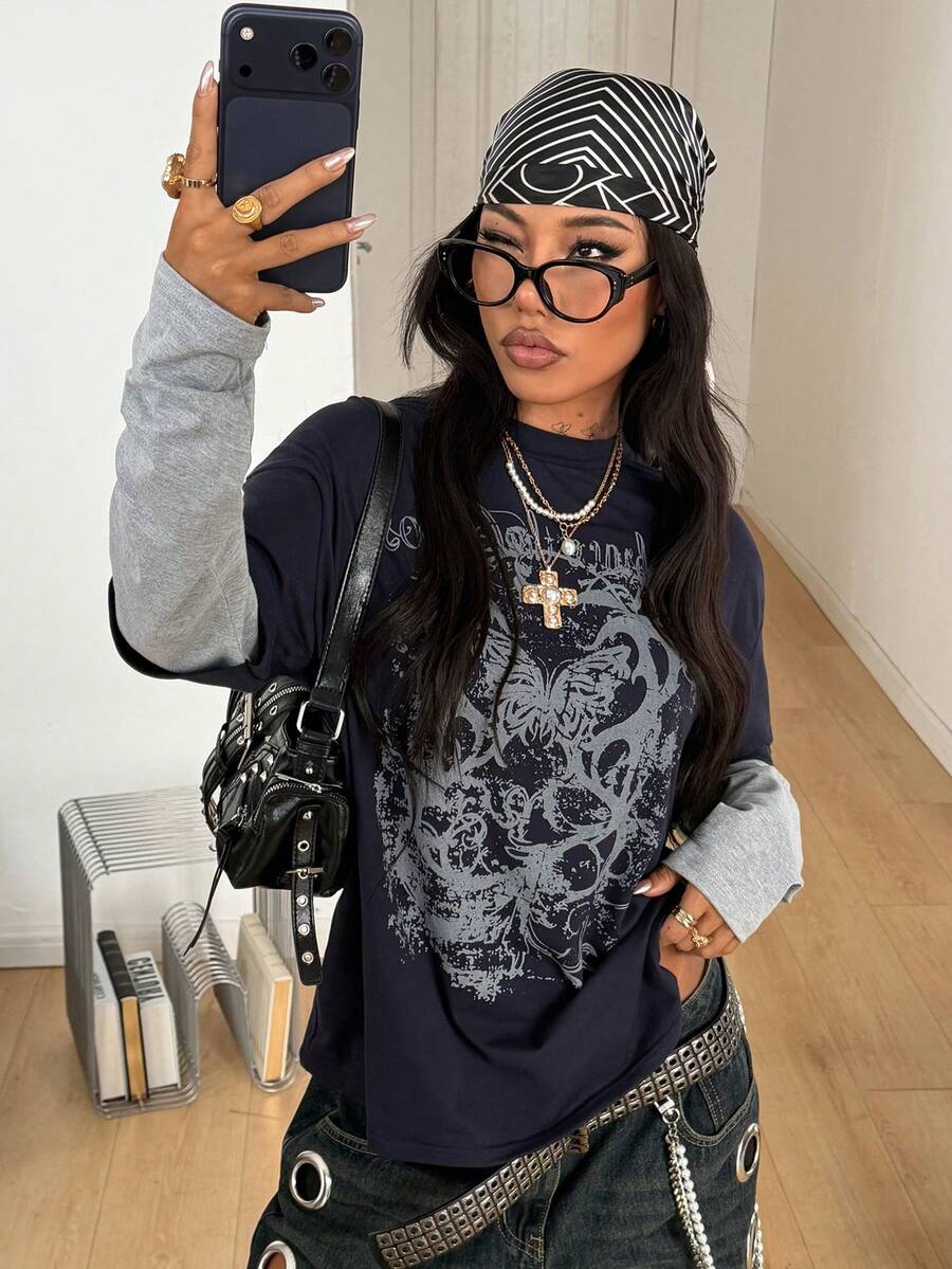 Women's casual graphic long sleeve t-shirt with a round neck, drop shoulder sleeves, and loose relaxed fit.