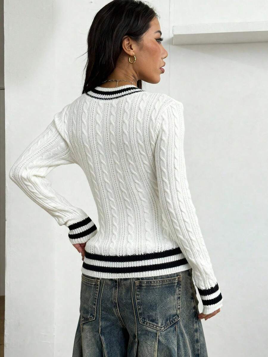 Women's slim fit cable-knit sweater with a V-neckline and long sleeves in solid green rib knit fabric.