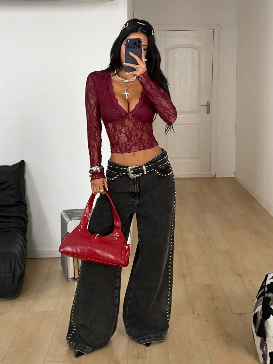 Women's polka dot sheer mesh crop blouse featuring contrast scallop lace trim along the V-neckline and long sleeves in a slim fit silhouette.