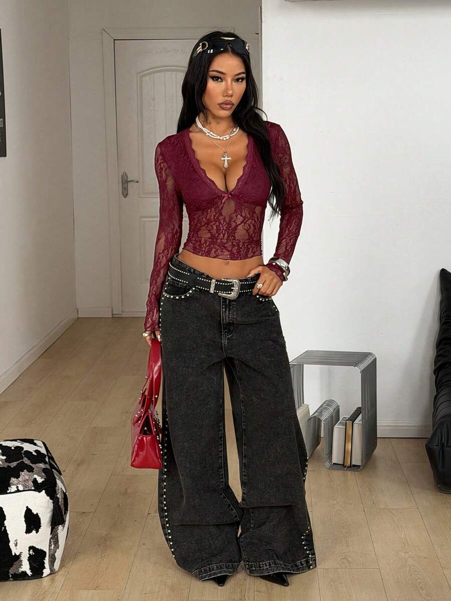 Women's polka dot sheer mesh crop blouse featuring contrast scallop lace trim along the V-neckline and long sleeves in a slim fit silhouette.