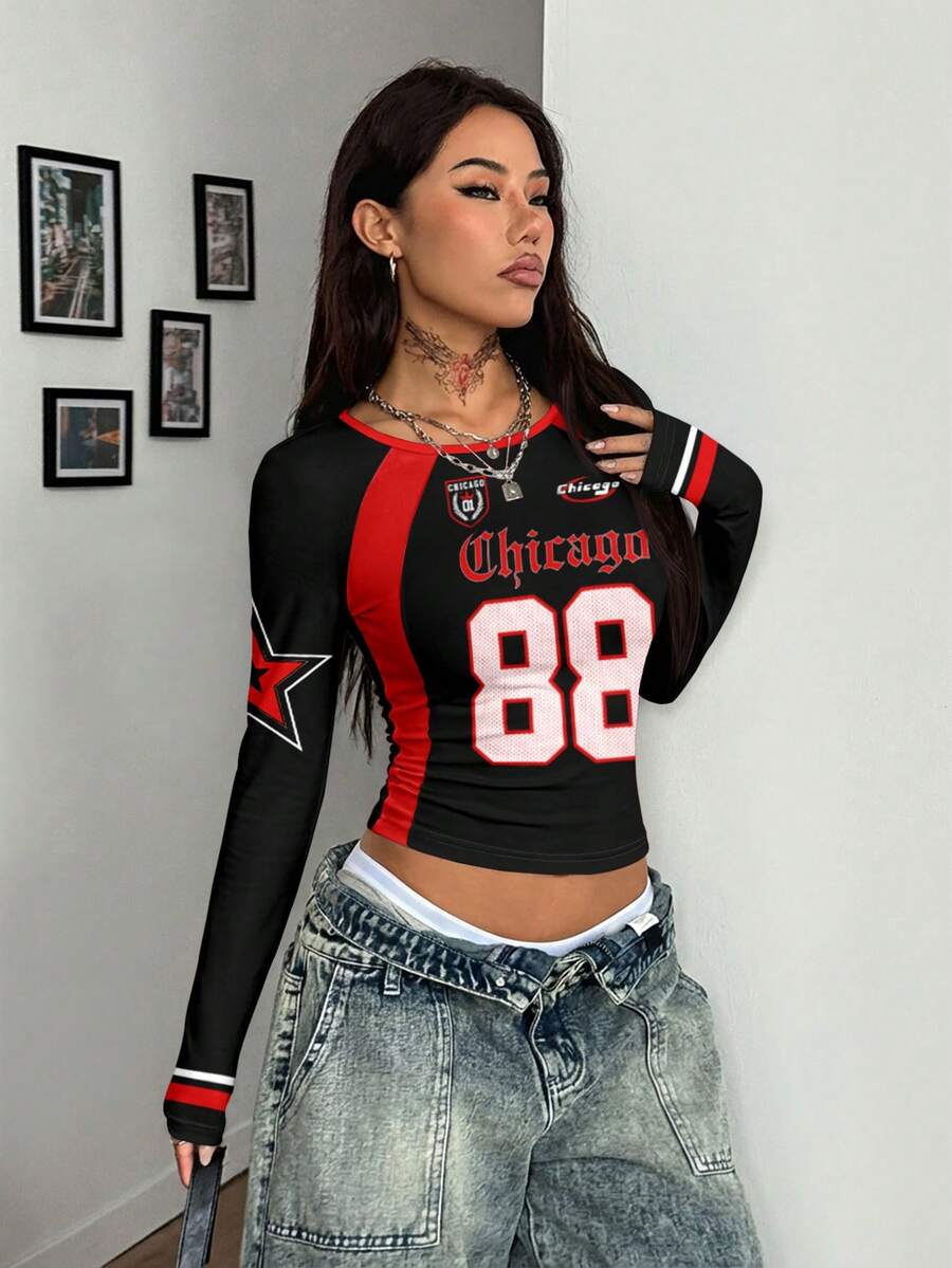 Women's slim fit long sleeve raglan t-shirt with collegiate letter graphic print, round neck, and contrast binding.