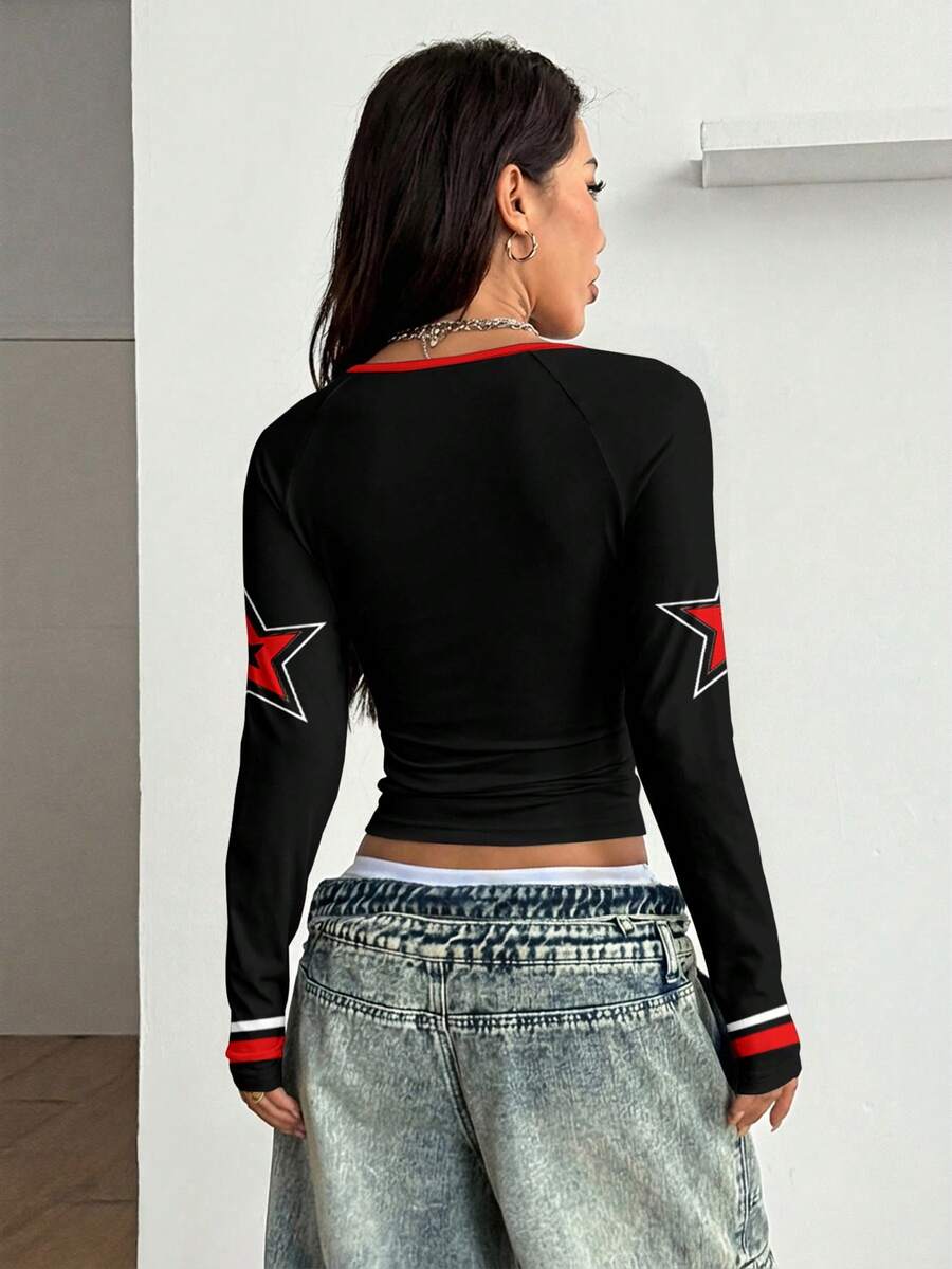 Women's slim fit long sleeve raglan t-shirt with collegiate letter graphic print, round neck, and contrast binding.
