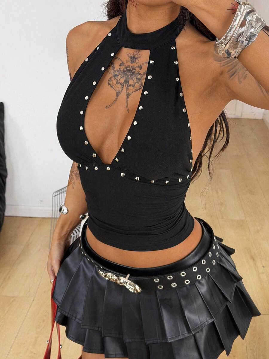 Women's metallic halter tank top featuring a plunging V-neck, slim fit cut, and backless tie-back design