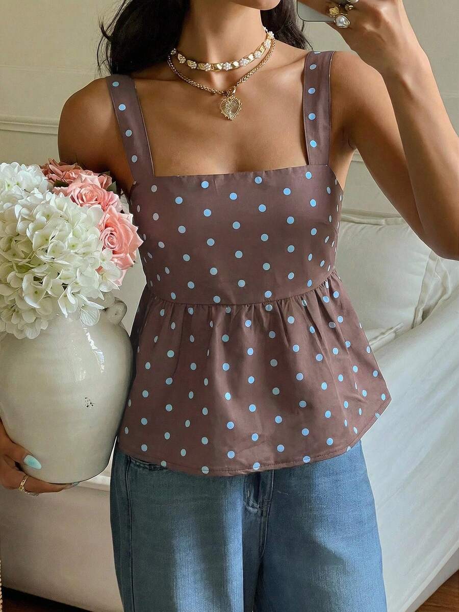 Women's casual polka dot tank top with tie-front knot, strap neckline, backless design, and ruffle flared hem