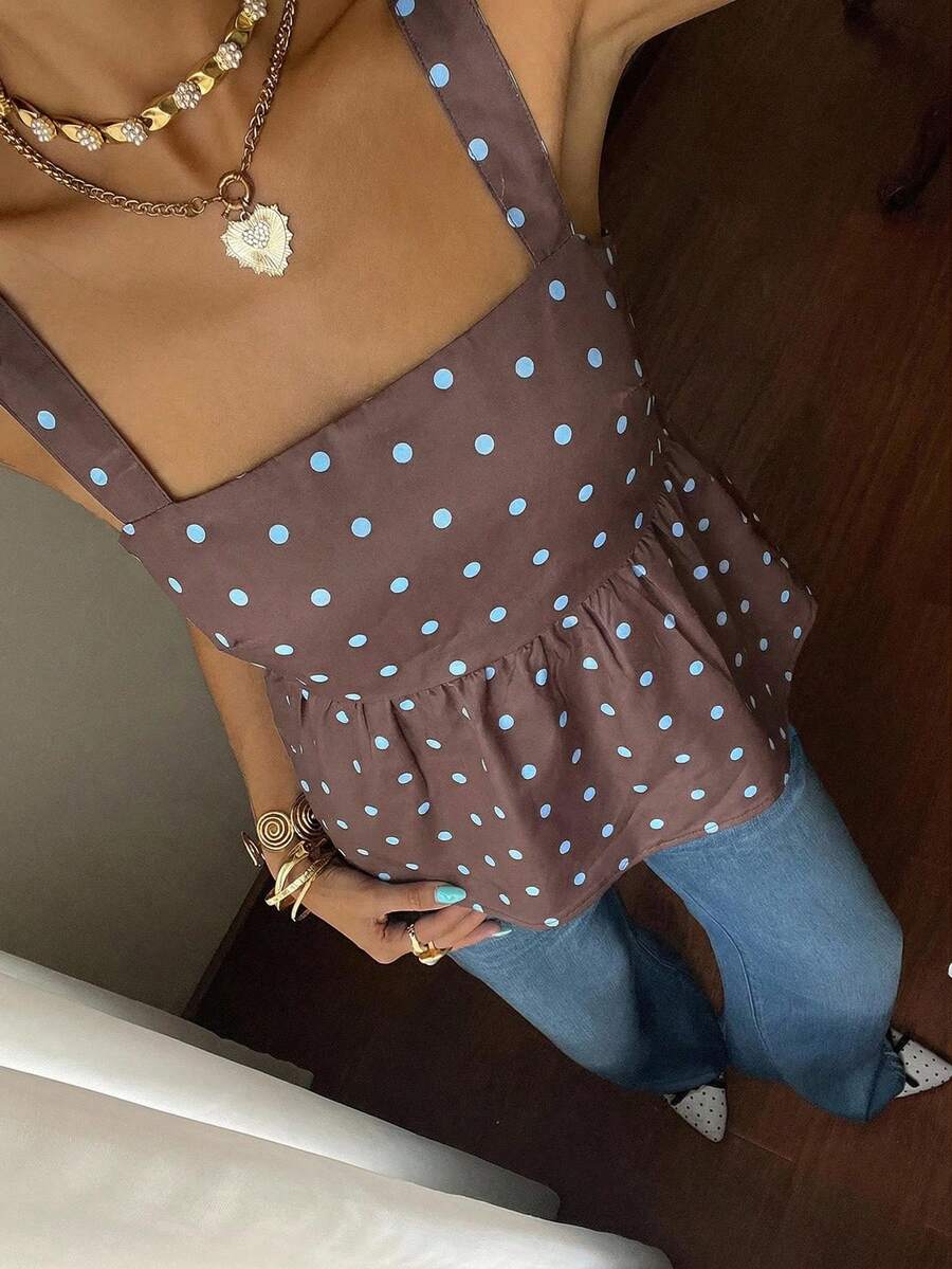 Women's casual polka dot tank top with tie-front knot, strap neckline, backless design, and ruffle flared hem