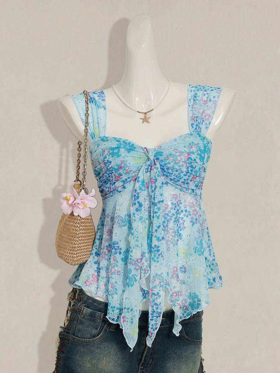 Women's white cherry print cami top with wide straps, ruched knot detail, and an asymmetrical hem