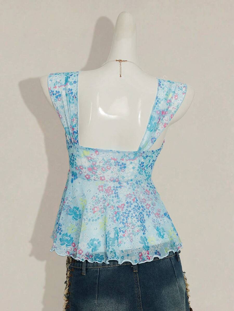 Women's white cherry print cami top with wide straps, ruched knot detail, and an asymmetrical hem
