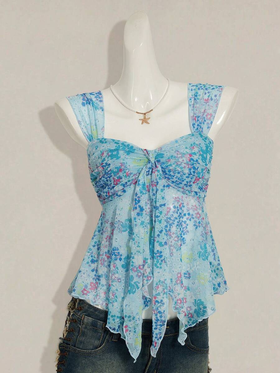 Women's white cherry print cami top with wide straps, ruched knot detail, and an asymmetrical hem