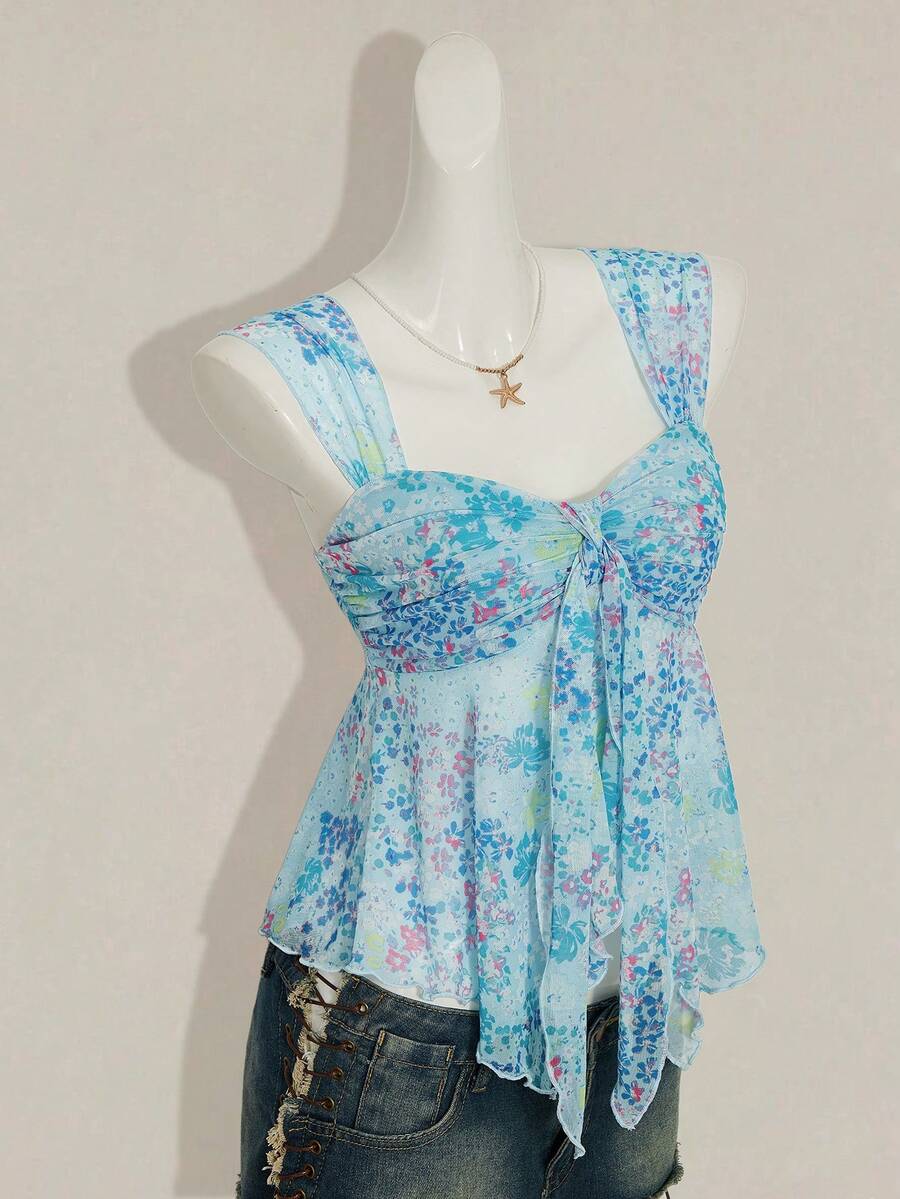 Women's white cherry print cami top with wide straps, ruched knot detail, and an asymmetrical hem