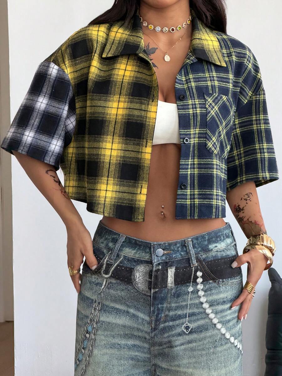 Women's plaid crop shirt with button front, chest pocket, short sleeves, and loose casual fit.