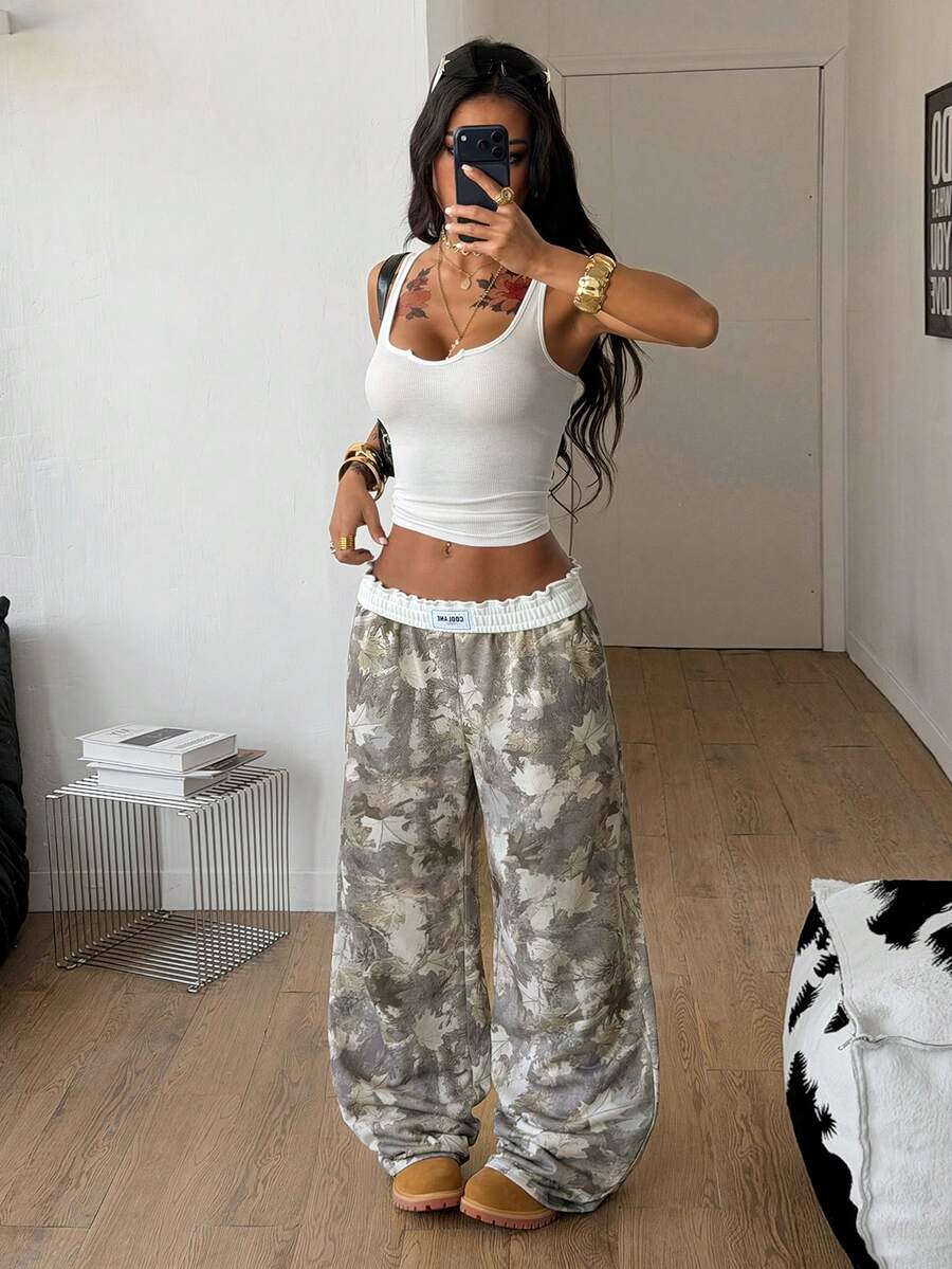 Women's striped straight leg casual trousers with elastic mid waist and side pockets