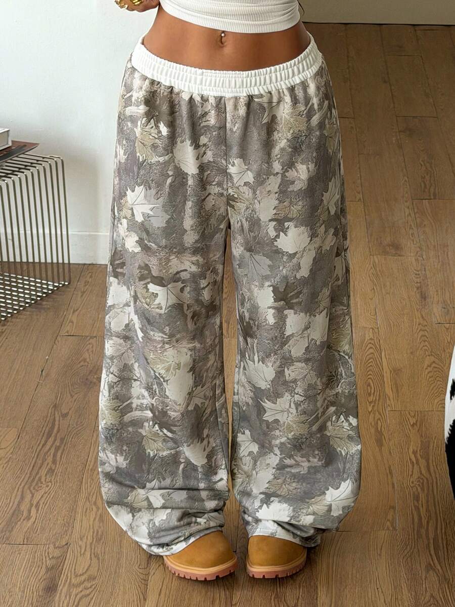 Women's striped straight leg casual trousers with elastic mid waist and side pockets