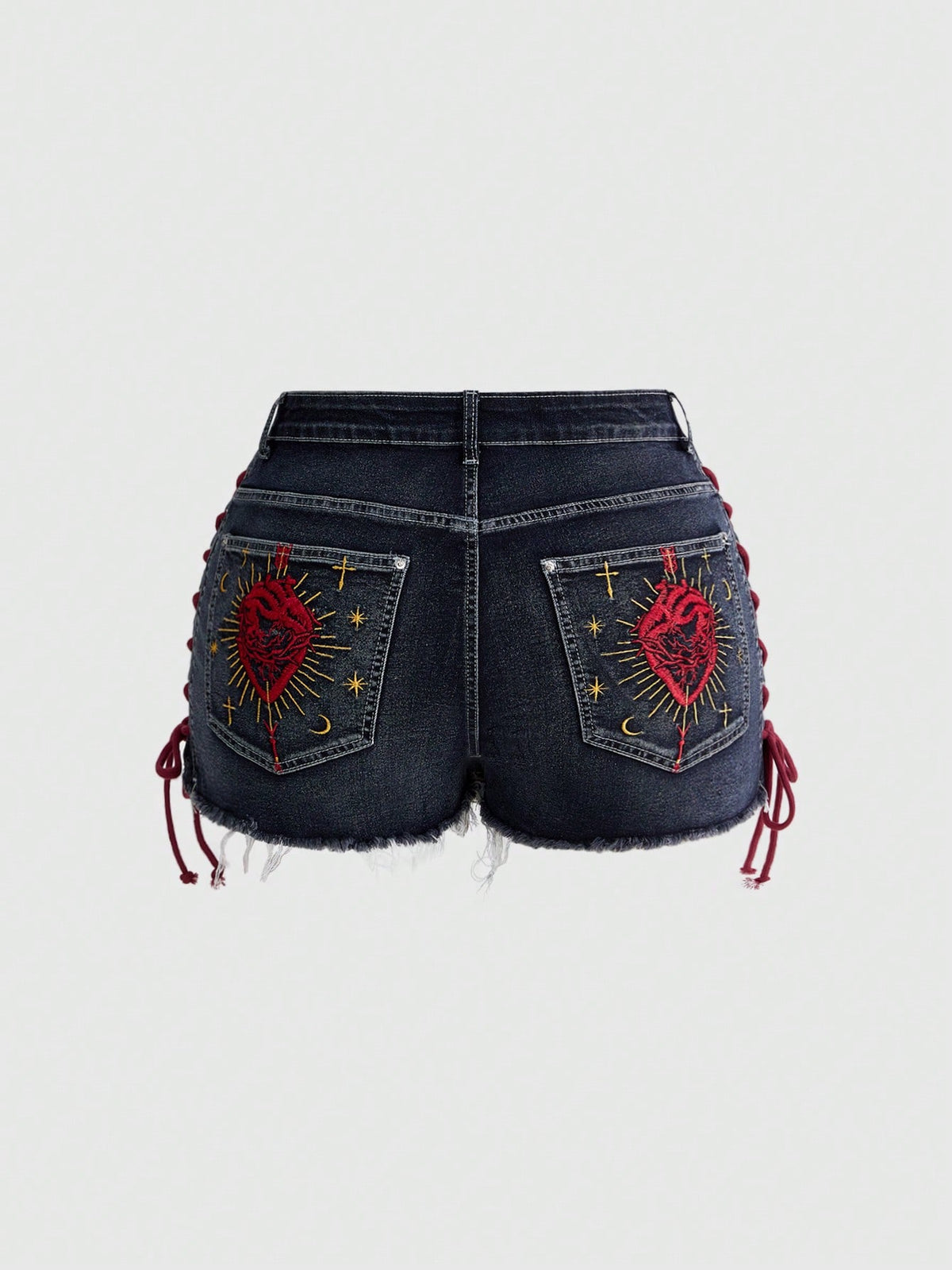 Plus size black gothic mini shorts with heart embroidery, graphic pocket pattern, lace-up detail, raw hem, and zipper fly