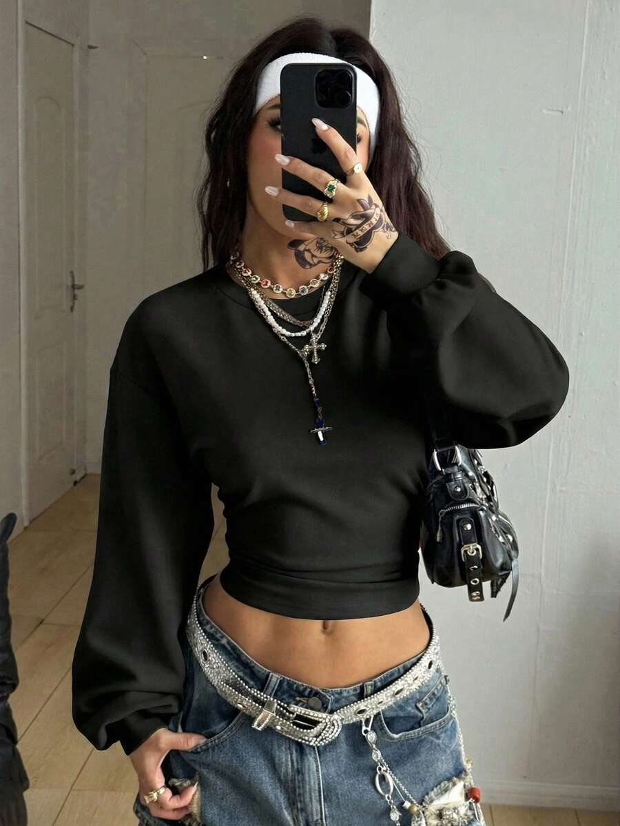 Women's brown waist-cinching sweatshirt featuring a round neck, drop shoulder long sleeves, and rib-knit cuffs.
