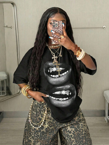 Women's oversized graphic crew neck t-shirt made of 100% white cotton knitted fabric with drop shoulder half sleeves.