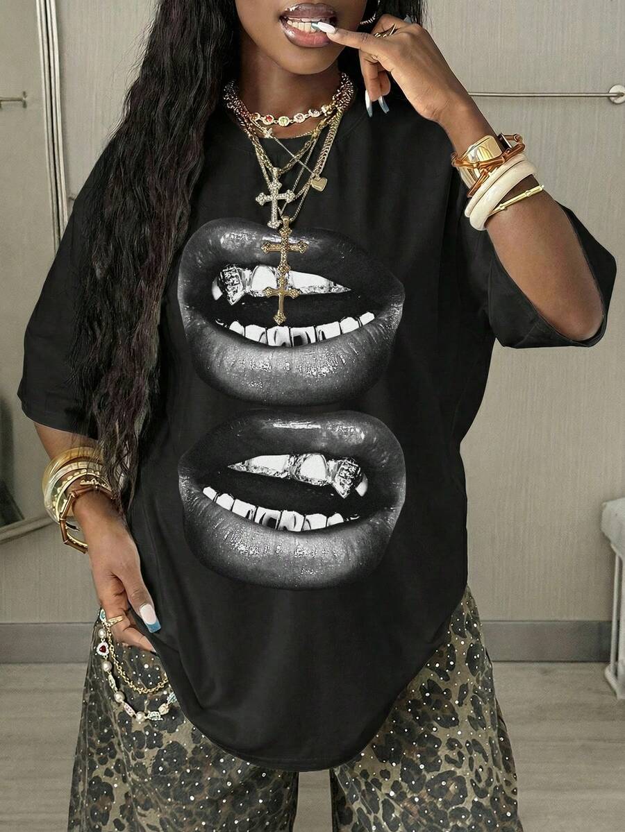 Women's oversized graphic crew neck t-shirt made of 100% white cotton knitted fabric with drop shoulder half sleeves.