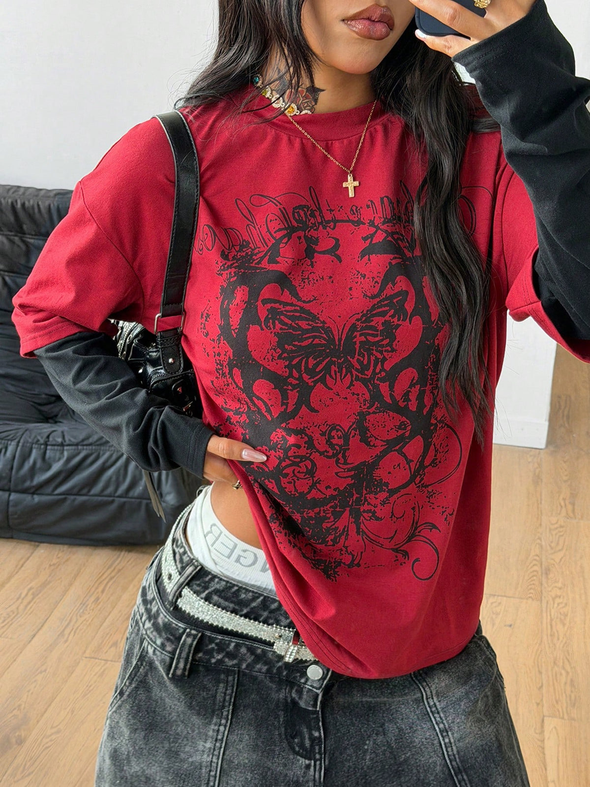 Women's casual graphic long sleeve t-shirt with a round neck, drop shoulder sleeves, and loose relaxed fit.